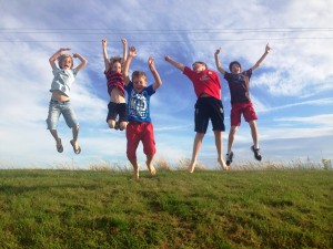 Boys jumping at the caravan park