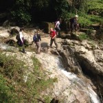 Sheila leading the way over a waterfall just before she stripped off to her long johns