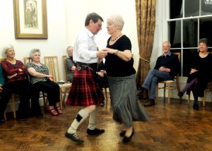 Ken and Anne giving a dancing demo on a walking holiday