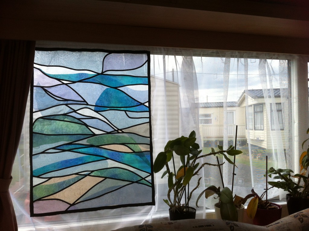 Sheila's stained glass curtain inspired by Paula's chapel window