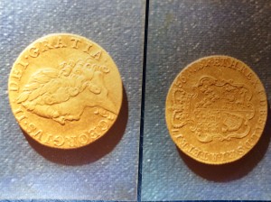 The coin (both sides)