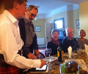 Ken-the-kilt and Stewart address the haggis