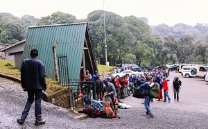 The porters weighing the kit on Kili