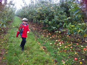 Oscar's brother, Ivor, having fun in the orchards near Sheila's house