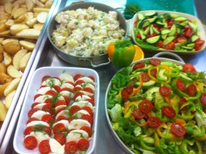 Salads made and potato wedges ready to go in the oven