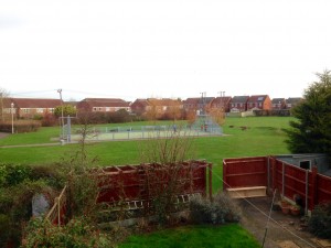 The boys on the football pitch outside our back gate