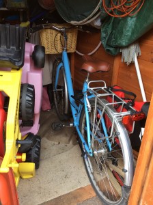 Blue bicyle in the shed.png