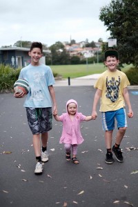 Oscar with Onnie and Milo in Oz - with a football