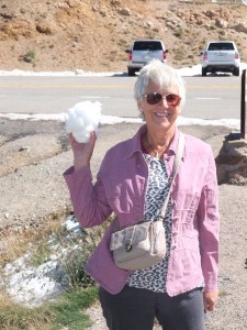 Sheila with a snowball looking quite happy at altitude on the Continental Divide