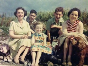 Stew and Len in the middle with Len's mum, Anne, and sister, Margaret, on the left; and Stewart's mum, also Margaret, and Rusty the dog on the right.