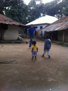 Oscar playing football with Brian and another little lad